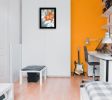 Black frame "Tiger Lily in Orange" by Roey Ebert, ready to hang